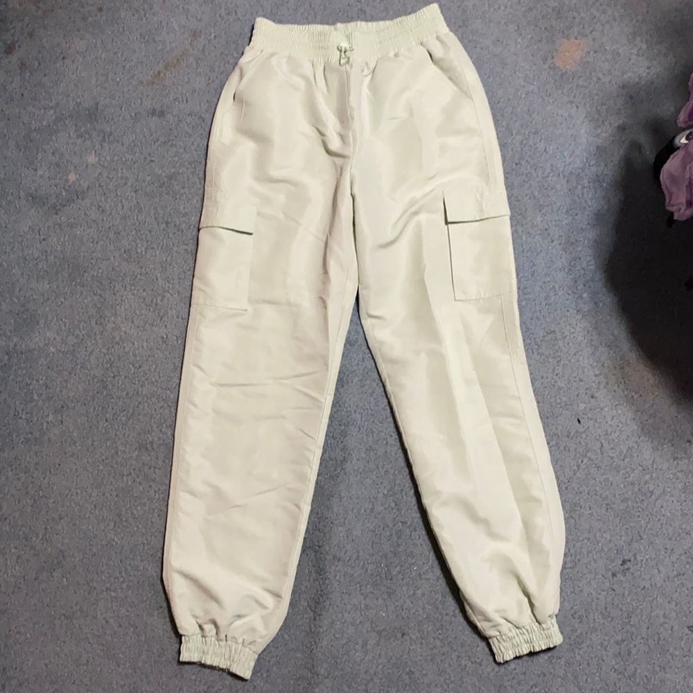 Bright green nylon joggers